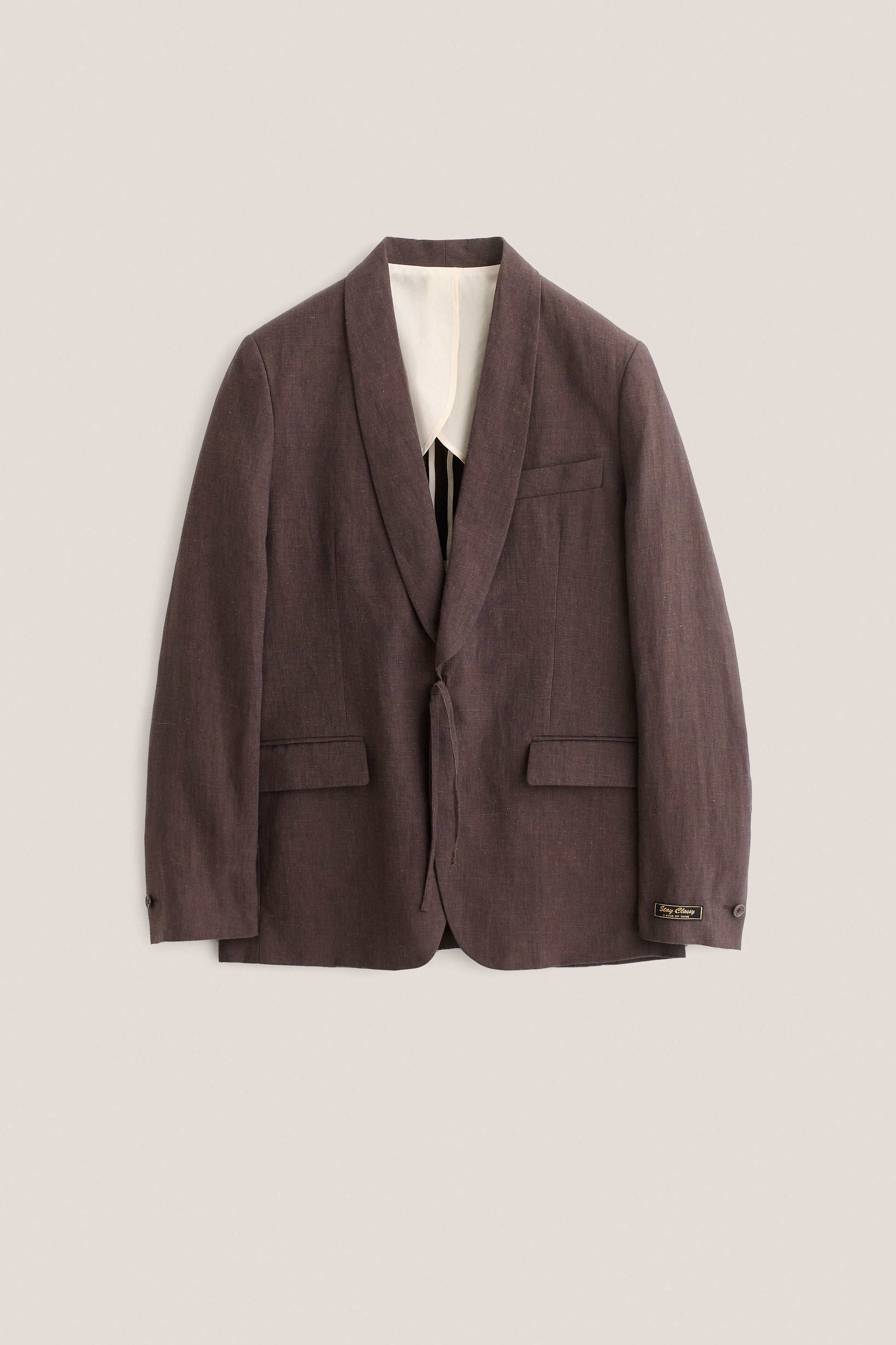 Men's tailoring blazer, 100% linen, burnt umber, with shawl collar, flap pockets, and kimono-inspired cord closure.