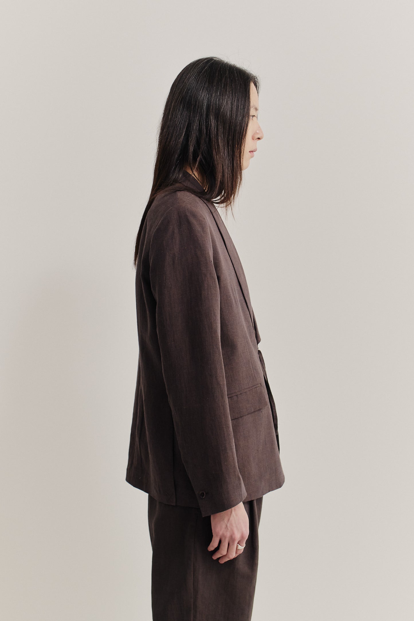 Men's tailoring blazer, 100% linen, burnt umber, with shawl collar and kimono-inspired cord closure.