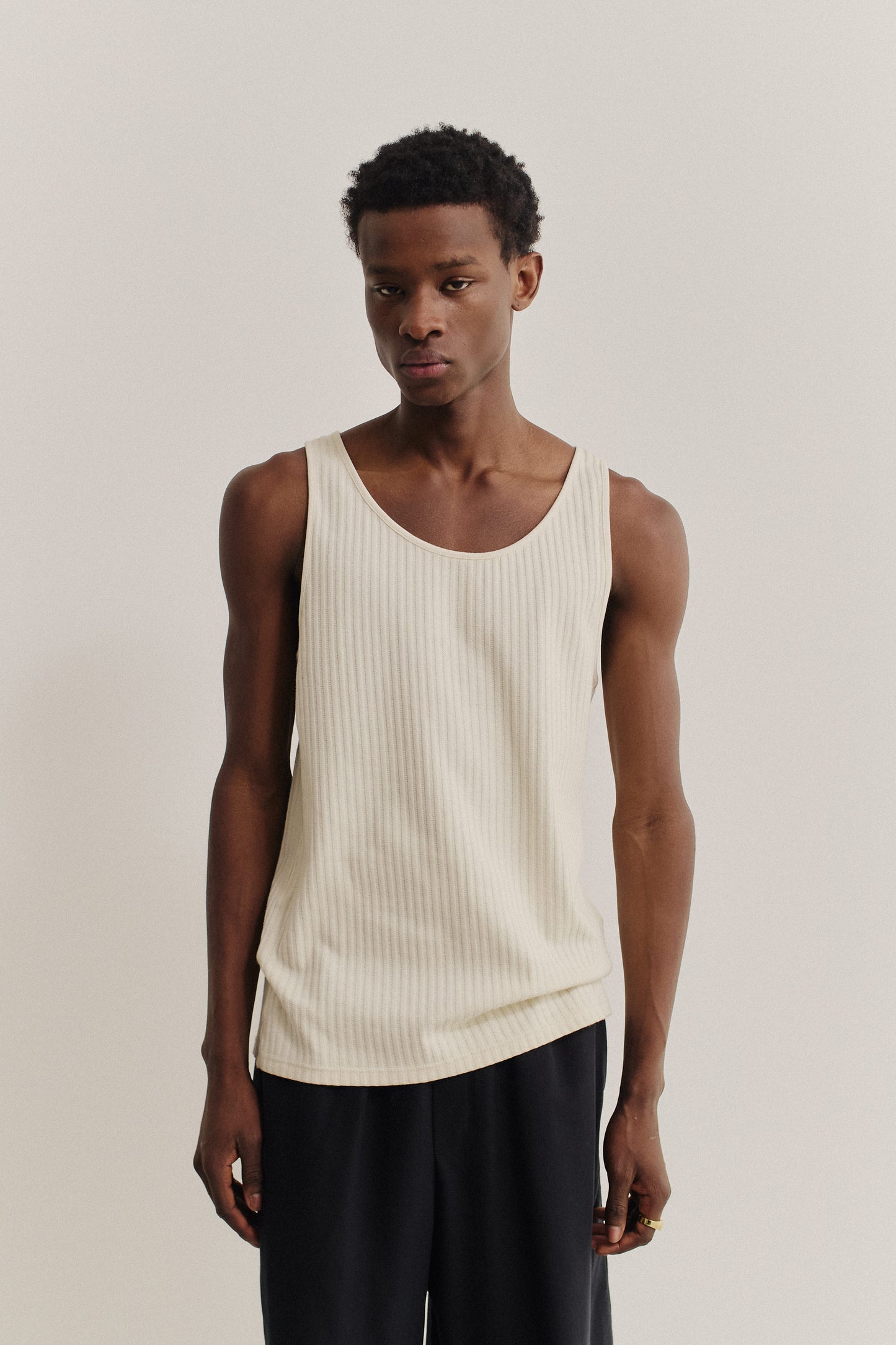 Men's jersey tanktop, off-white cotton rib with pointelle detailing.