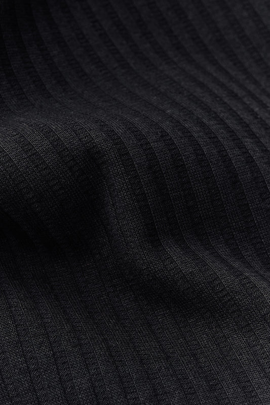 Unisex jersey tanktop, cotton mix, garment dyed, black, with rib structure and delicate openwork detailing.