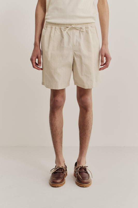 Men's shorts, cotton blend ripstop, natural beige, with adjustable drawstring waist and side pockets.