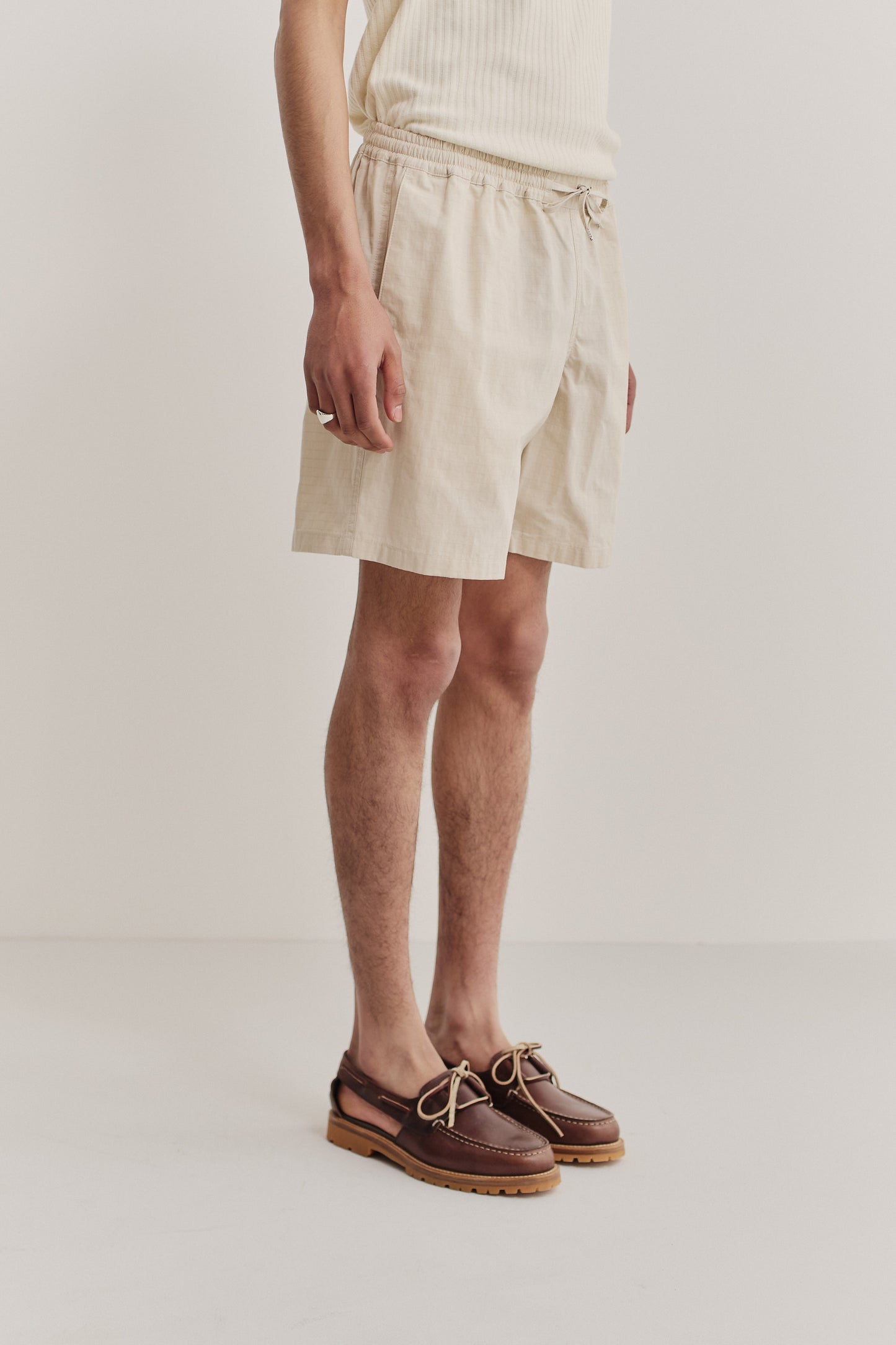 Men's shorts, cotton blend ripstop, natural beige, with adjustable drawstring waist and side pockets.