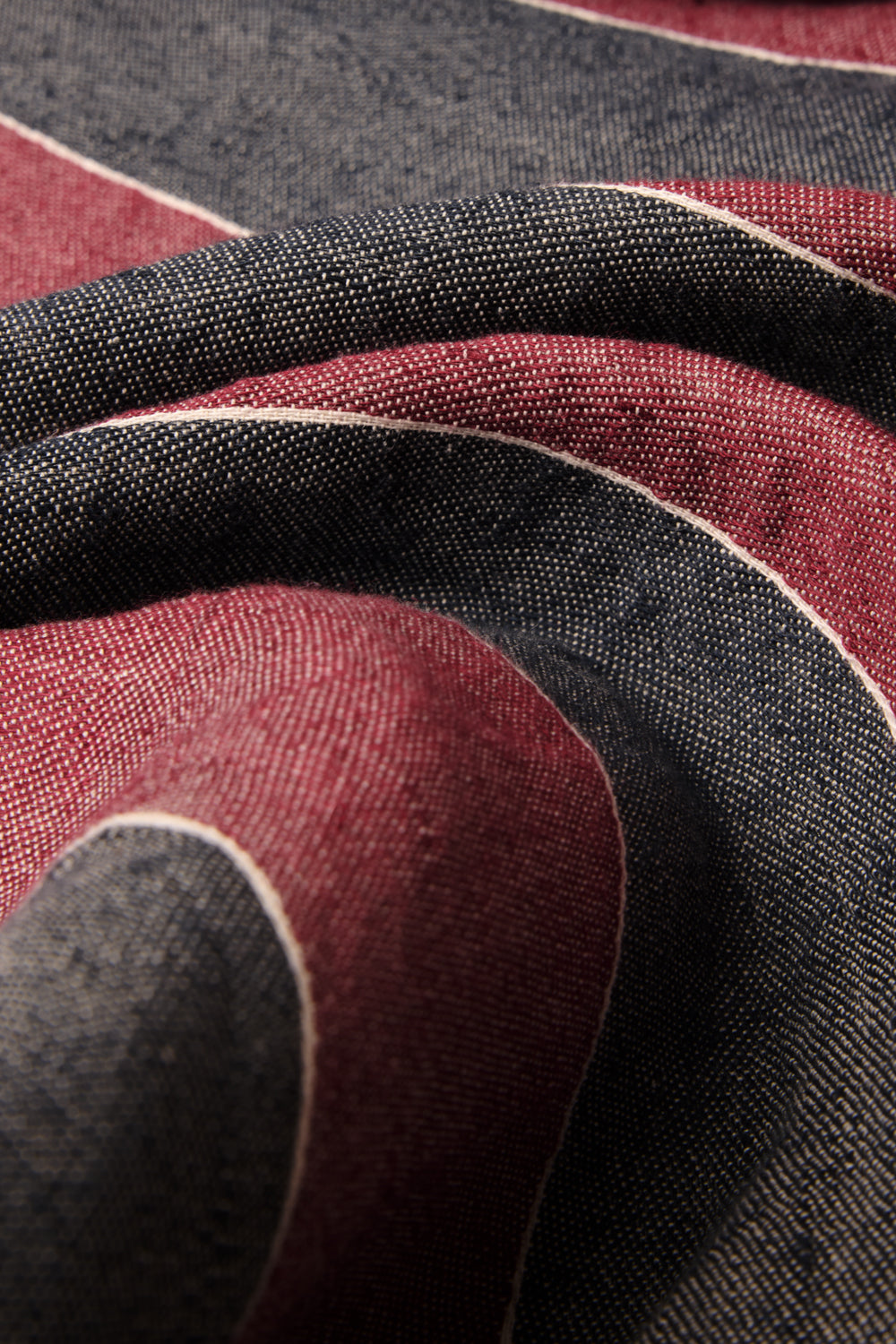 Accessories beach towel, red and navy striped linen-cotton blend, woven on a Jacquard loom.