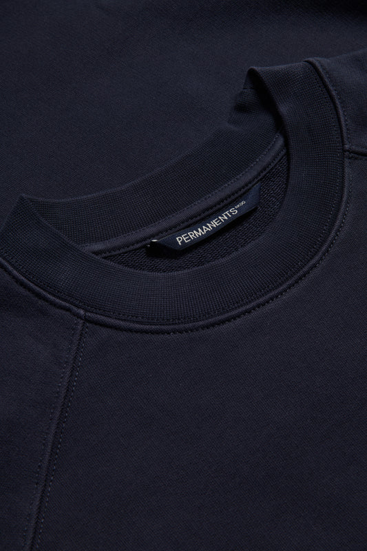Men's knit sweater, organic cotton, pre-washed, navy, with raglan sleeves and discreet logo.